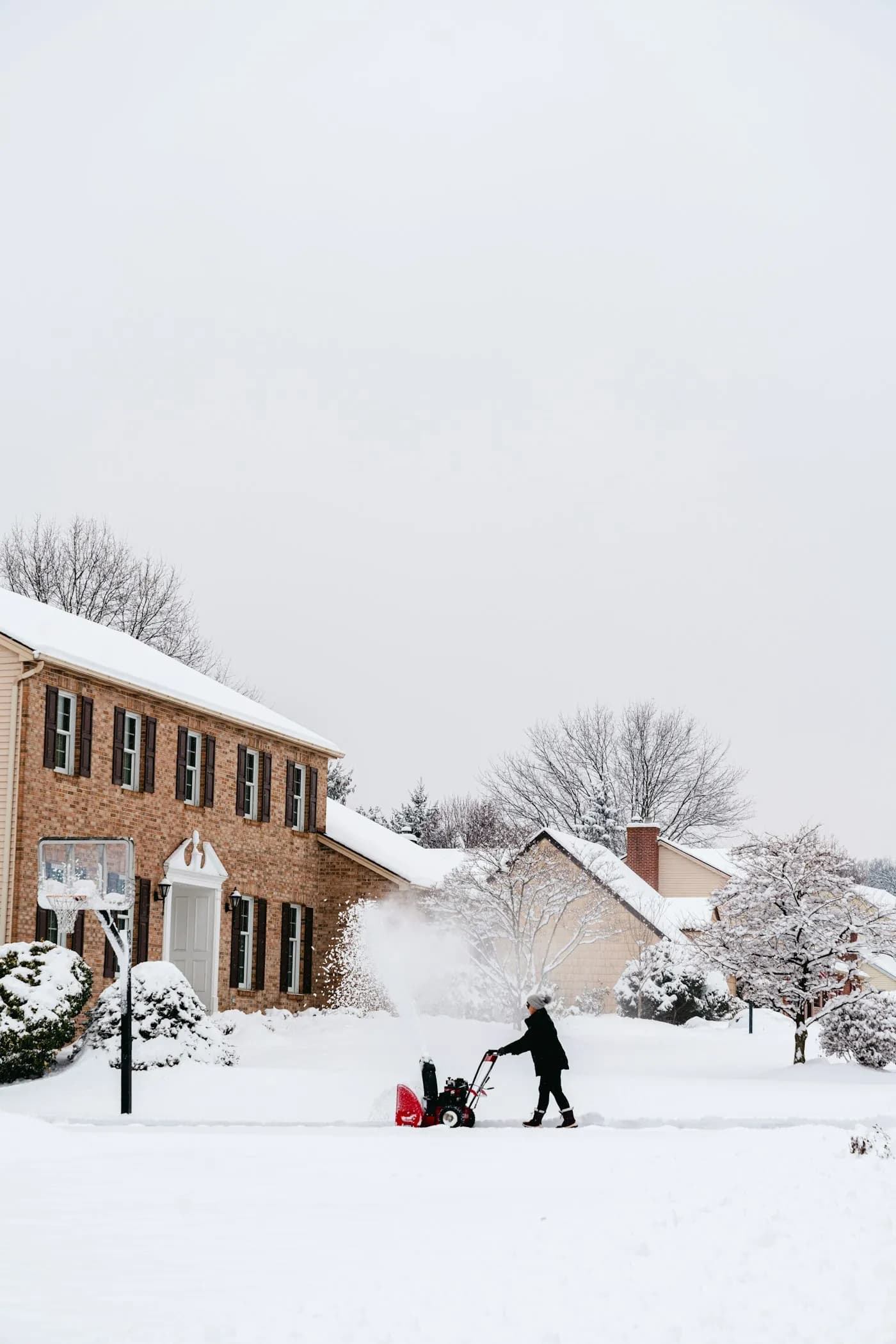 Residential driveway cleared of snow on a winter morning in Mokena, IL